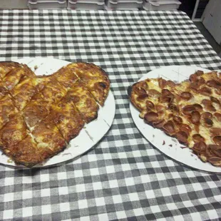 two slices of heart shaped pizza