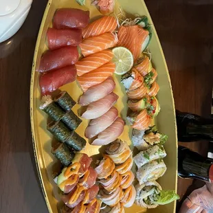 Top Tuna, Salmon, and Yellowtail NIGIRI.  LEFT is basic Tuna &amp; Salmon roll.  Chesapeake Roll, Dynamite Roll, &amp; Chilean Sunset Roll