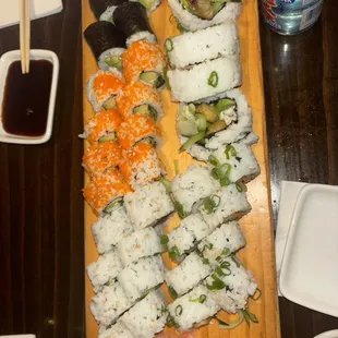 L: Avocado roll, California roll, tuna avocado roll R: Chesapeake roll, Garlic Scallop roll