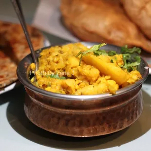 Aloo Gobhi ($13.99) - Cauliflower and potatoes sauteed with tomatoes, onions, ginger, herbs and spices. Good!