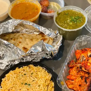 Mango Lassi Chicken Biryani Palak Paneer Tandoori Chicken Lamb Curry Naan Kheer Gulab Jamun