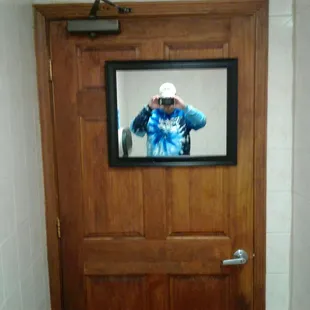 Thoughtless door coming out of the bathroom was cool and had a cool mirror on it