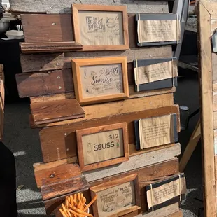 a stack of wooden crates and a bucket of french fries