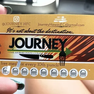 a person holding a business card