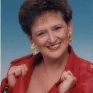Joan C.