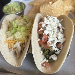 Chicken tinga taco and nopales taco