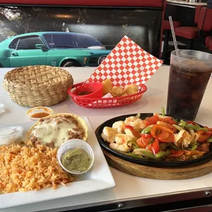 a plate of food and a drink