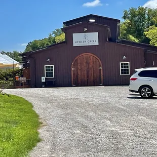 a car parked in front of the winery