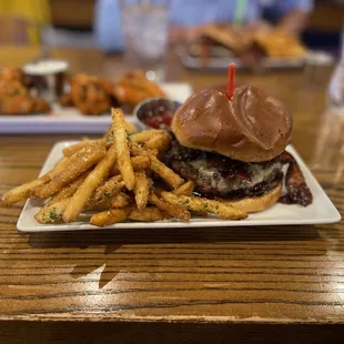 Western cheeseburger with bacon and Parmesan cheese fries