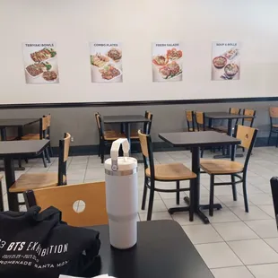 empty tables and chairs in a restaurant