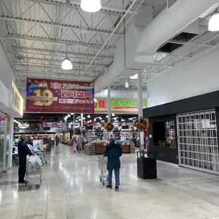 Joy Dim Sum on the left in walkip to the Jusgo Asian Market entrance