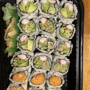a tray of sushi rolls