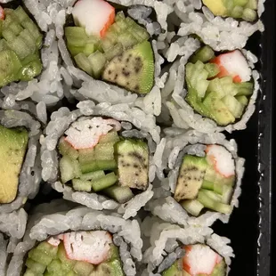 a tray of sushi rolls