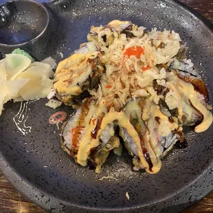 Volcano Roll: Spicy tuna is the lava inside.  The roll makes up the mountain.