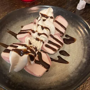 Mochi Ice Cream.  Ice cream inside of gelatin shells.  Good but different.