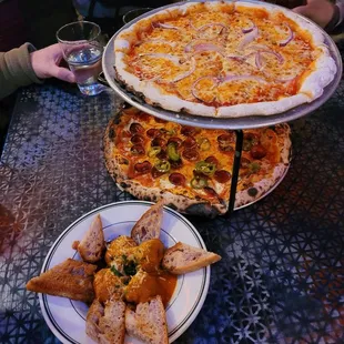 GF pizza (top), jalapeño pepperoni honey pizza (bottom)