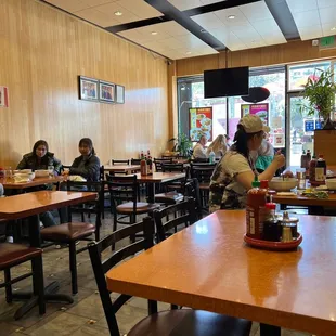 ows diners sitting at tables