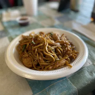 a plate of noodles on a table