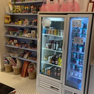 Fun candy and chotchky selection, options for both alcoholic and NA beverages, and pre-packed pints to go!