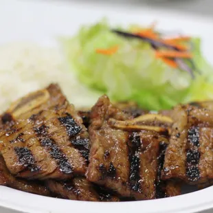 Grilled Beef Short Ribs () Kal-Bi Very popular Korean meat dish made from beef short ribs...