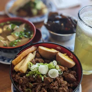 Minced pork rice, green tea, seasonal soup, wood ear mushroom salad, and scallion bread sandwich with bean curd