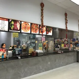  restaurant counter with a variety of food items
