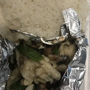 ice, broccoli, and mushrooms wrapped in aluminum foil