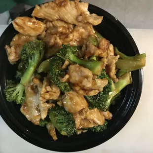 a bowl of chicken and broccoli