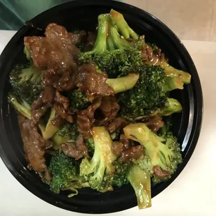 a bowl of beef and broccoli
