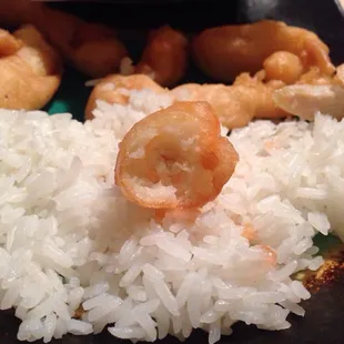 A little nugget of chicken in the middle of a bunch of batter