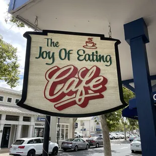 a sign for a cafe