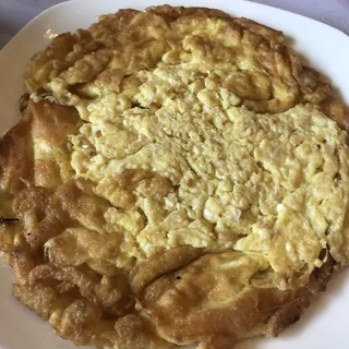 Scrambled Egg Served with preserved radish.