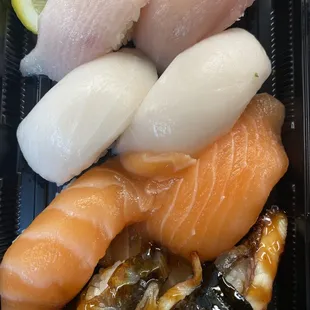 Nigiri Sushi... Salmon, White Tuna, Yellowtail, and broiled fresh water Eel (unagi).  BIG thick cuts of fish.  SO FRESH!!