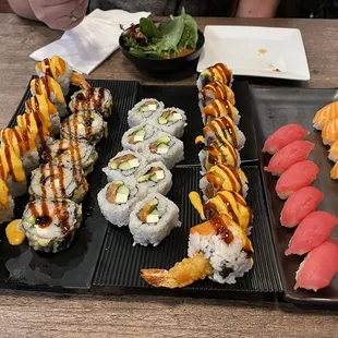 Left to right: 8 Piece Sexy Crunch Roll, 5 Piece Las Vegas Roll, 8 Piece Alaskan Roll, 8 Piece Spicy Crunch Roll, Tuna Sushi, Salmon Sushi