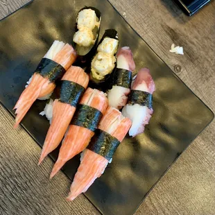 a plate of sushi on a table