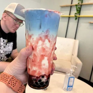 Butterfly pea and strawberry milk tea with regular boba
