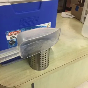 the inside of a cooler on a table