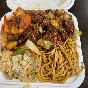 a take out container of chinese food