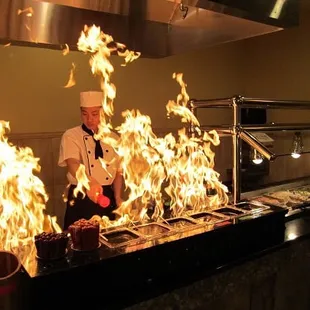 hibachi grill ! He is on fire.