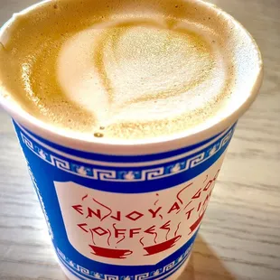 Cappuccino made with oat milk and they&apos;re in-house cinnamon honey syrup