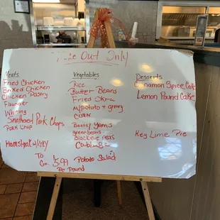 a menu on a white board