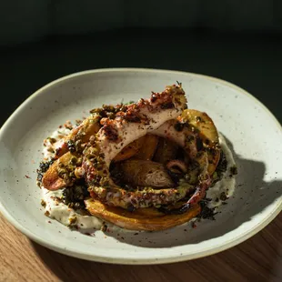 Charred Spanish Octopus 

mustard greens, blood orange, crispy wieser potatoes, remoulade.