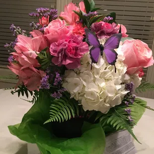 Centerpiece for a work retirement cake table. Beautiful and very reasonably priced. Perfect!!