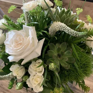 Fantastic arrangement in the same theme as our wedding bouquet, put together for our first anniversary. A home run, as always.