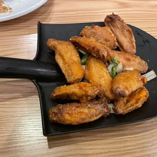 Wings were served on a shovel lol