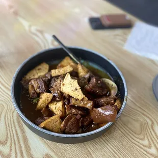 Stewed pork belly with tofu