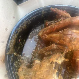 Cassava leaves with chicken, fish, and beef.