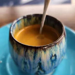 Espresso with a couple drops of Almond milk