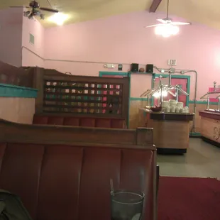 a glass of soda on a table