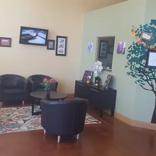 Front desk with classroom activity displayed on the TV